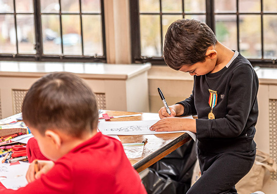 Children writing thank you letters