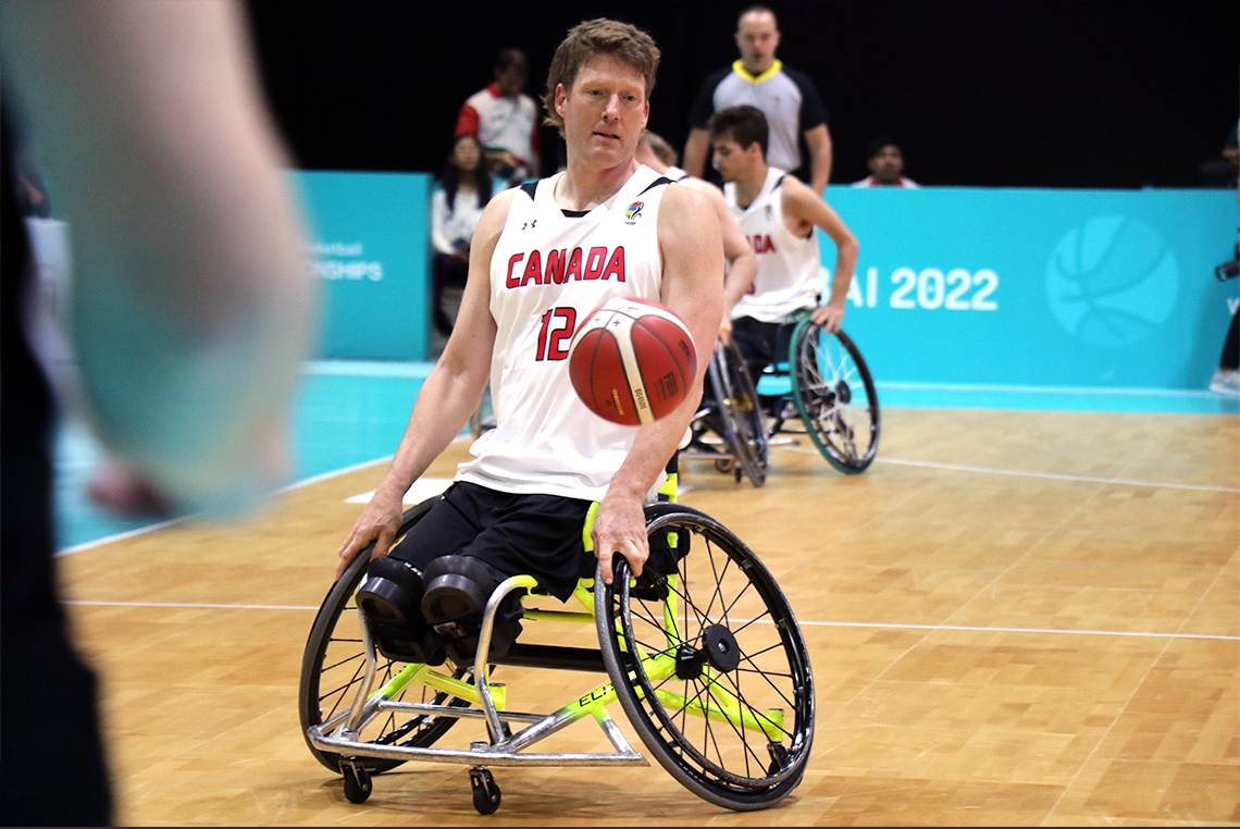Patrick Anderson moves across the court towards the ball.  