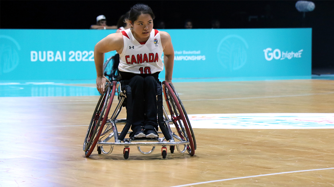 Puisand Lai moves across the court.
