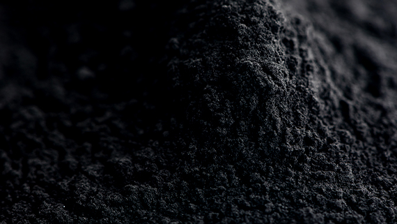 A pile of coal dust or activated carbon.